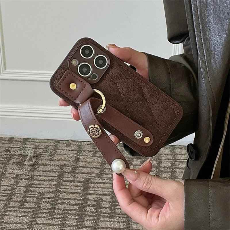 Cute Leather Phone Case with Fashion Wrist Strap for iPhone 11, 12, 13, 14, 15 Pro Max, XS, XR, X, and 15 Plus - Touchy Style .