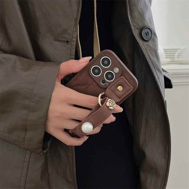 Cute Leather Phone Case with Fashion Wrist Strap for iPhone 11, 12, 13, 14, 15 Pro Max, XS, XR, X, and 15 Plus - Touchy Style .