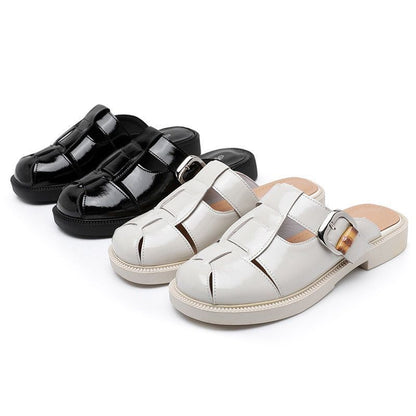 sandals with a closed-toe design and a low heel